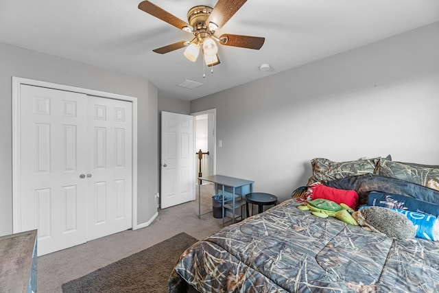 8315 Egret Bay Cir, Baytown, TX 77523 - bedroom featuring carpet flooring, ceiling fan, baseboards, and a closet