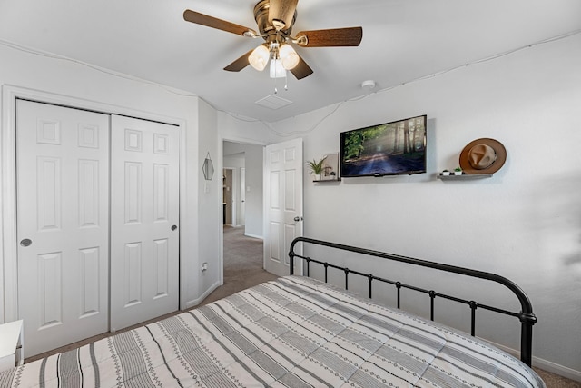 8315 Egret Bay Cir, Baytown, TX 77523 - bedroom featuring baseboards, a closet, carpet floors, and ceiling fan