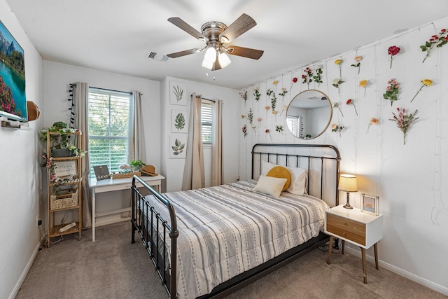 8315 Egret Bay Cir, Baytown, TX 77523 - bedroom with carpet floors, baseboards, and a ceiling fan
