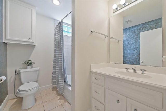 8715 Meadowcroft Dr Unit 1002, Houston, TX 77063 - full bath featuring toilet, tile patterned flooring, baseboards, vanity, and shower / bathtub combination with curtain