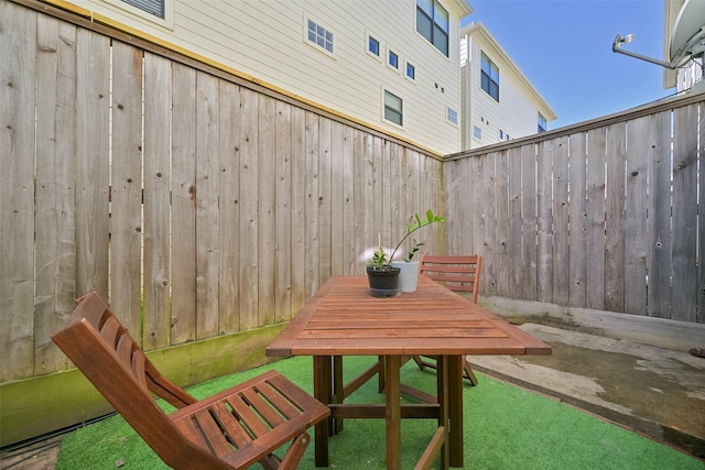 8715 Meadowcroft Dr Unit 1002, Houston, TX 77063 - view of patio / terrace featuring outdoor dining space