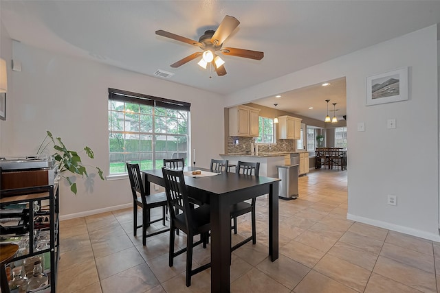 22627 Williamschase Dr, Katy, TX 77449 - dining area with baseboards, ceiling fan, light tile patterned floors, and recessed lighting