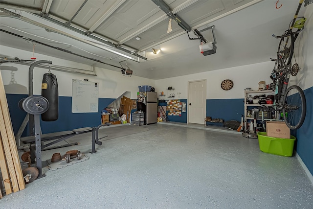 22627 Williamschase Dr, Katy, TX 77449 - garage with a garage door opener and freestanding refrigerator