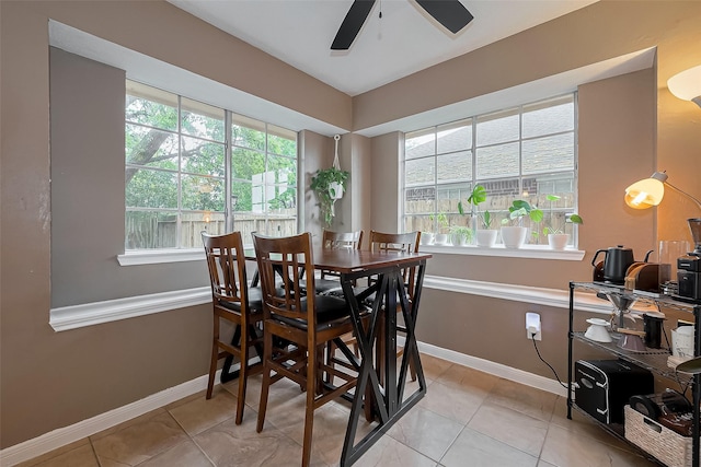 22627 Williamschase Dr, Katy, TX 77449 - dining area with a ceiling fan, baseboards, and light tile patterned floors