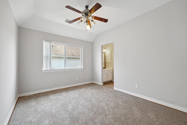 11127 Salento Ct, Richmond, TX 77406 - unfurnished bedroom with light colored carpet, lofted ceiling, baseboards, ensuite bathroom, and ceiling fan