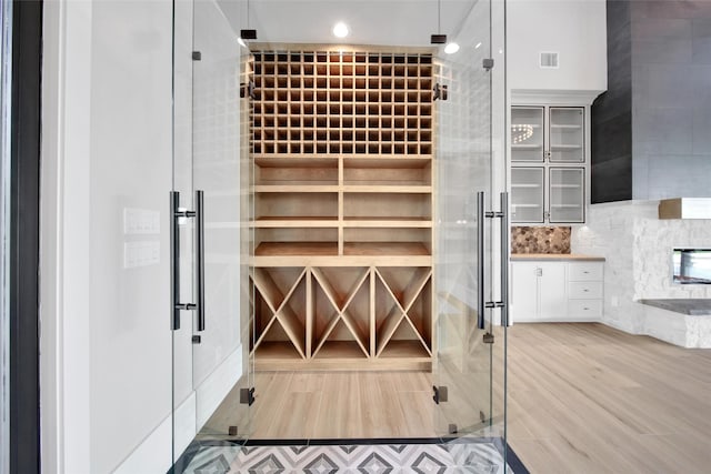 18829 Cypress Church Rd, Cypress, TX 77433 - wine room with light wood-style floors
