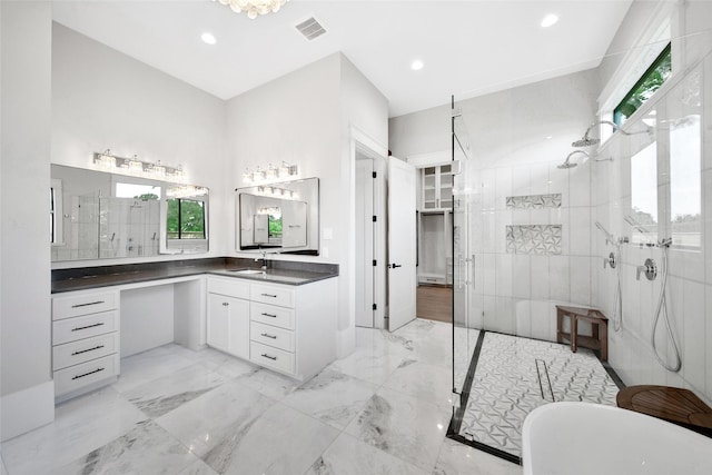 18829 Cypress Church Rd, Cypress, TX 77433 - bathroom featuring a stall shower, marble tiled flooring, vanity, a soaking tub, and recessed lighting