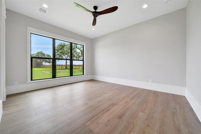 18829 Cypress Church Rd, Cypress, TX 77433 - empty room with light wood-type flooring, a ceiling fan, recessed lighting, and baseboards