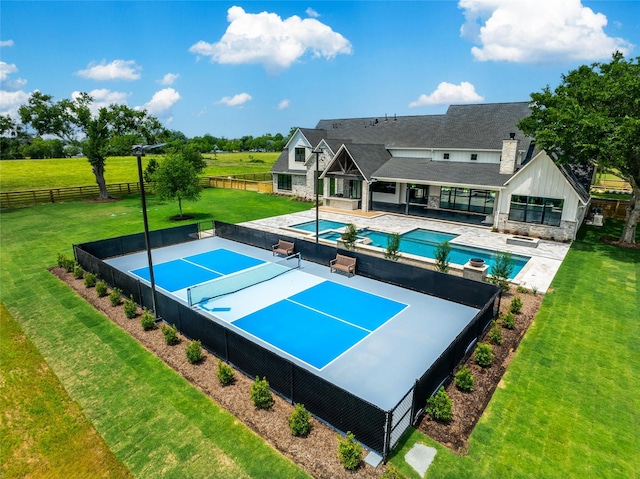 18829 Cypress Church Rd, Cypress, TX 77433 - view of tennis court with a pool with connected hot tub