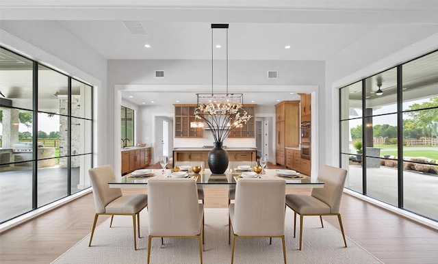 18829 Cypress Church Rd, Cypress, TX 77433 - dining area with a chandelier and recessed lighting