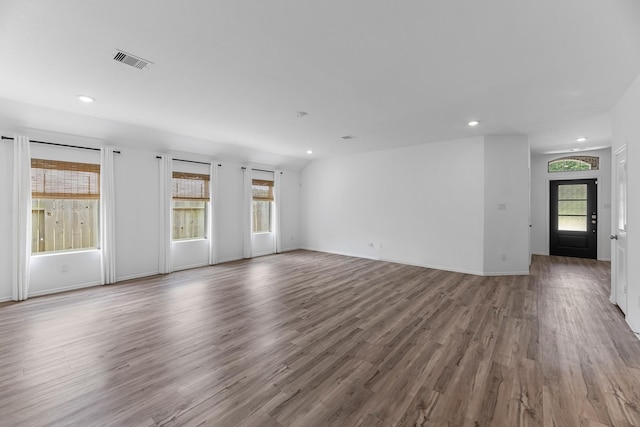 17723 Sapphire Pines Dr, New Caney, TX 77357 - unfurnished living room featuring recessed lighting, wood finished floors, and baseboards