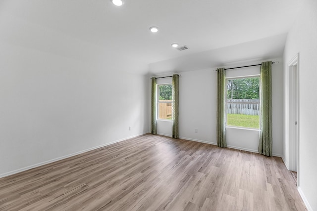 17723 Sapphire Pines Dr, New Caney, TX 77357 - spare room featuring light wood-style flooring, recessed lighting, and baseboards