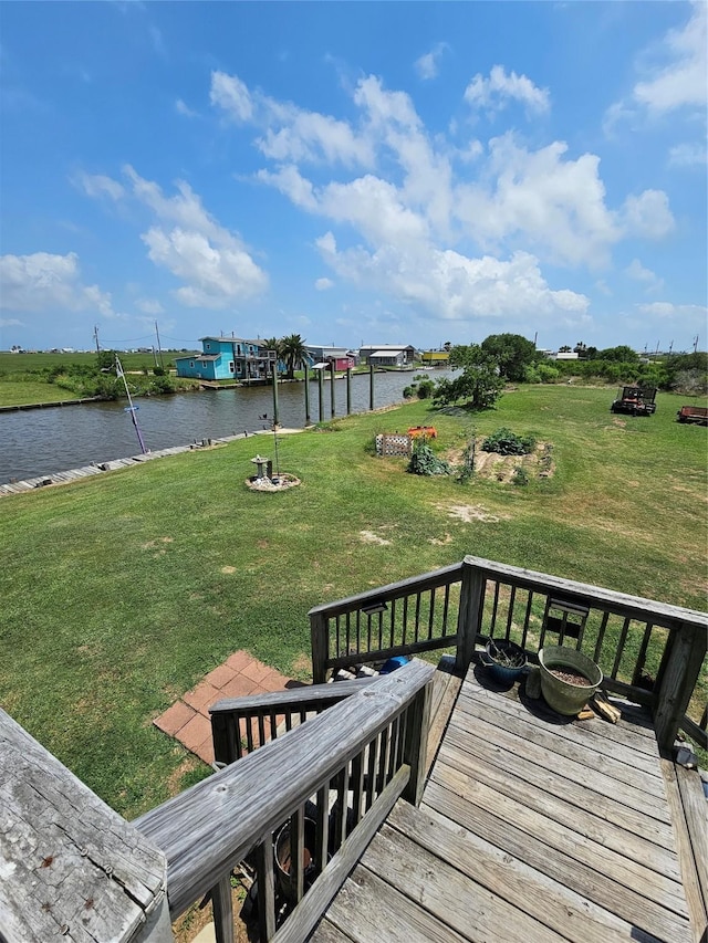 14545 Mariner St, Sargent, TX 77414 - wooden terrace featuring a water view and a lawn