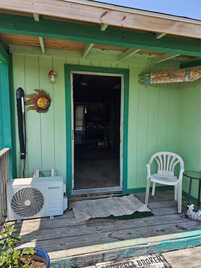 14545 Mariner St, Sargent, TX 77414 - doorway to property with a cooling unit