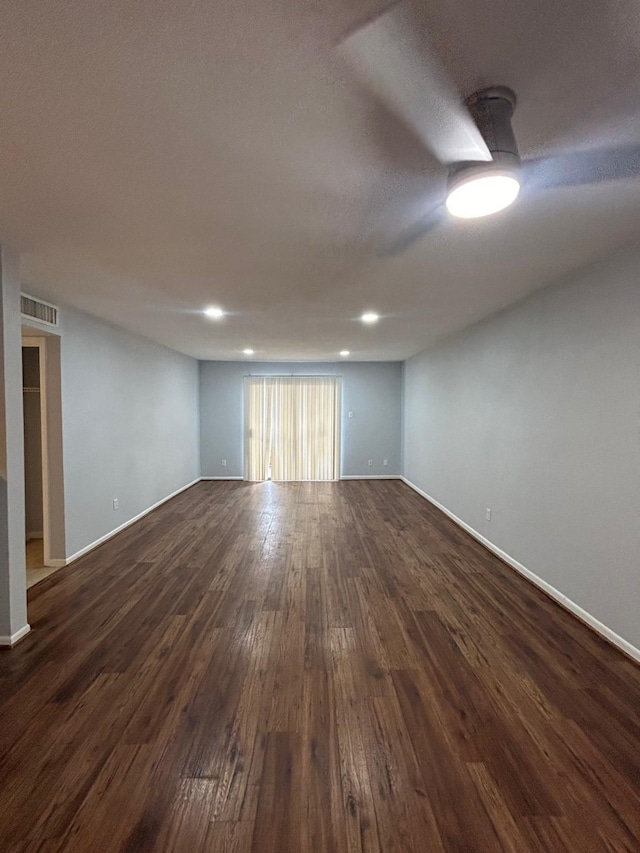 8435 Hearth Dr Unit 21, Houston, TX 77054 - unfurnished room featuring dark wood-type flooring, baseboards, and recessed lighting