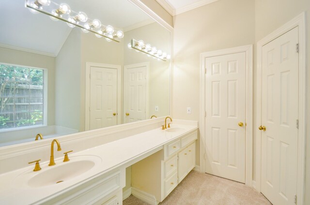 2303 Reflection Ct, Missouri City, TX 77459 - bathroom featuring double vanity, ornamental molding, and vaulted ceiling