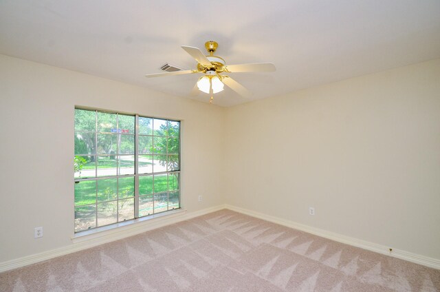 2303 Reflection Ct, Missouri City, TX 77459 - empty room with baseboards, light colored carpet, and ceiling fan