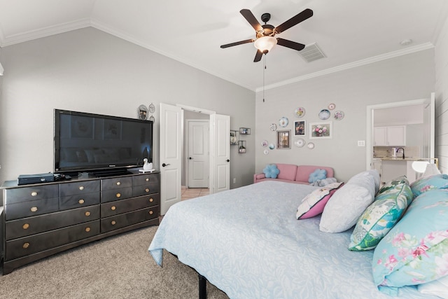 bedroom featuring crown molding, a ceiling fan, a sink, carpet, and lofted ceiling