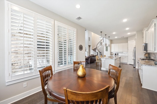 809 Stella Vista Ct, Katy, TX 77493 - dining space featuring dark wood-type flooring, recessed lighting, and baseboards