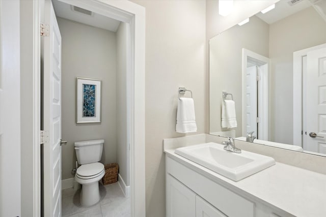 809 Stella Vista Ct, Katy, TX 77493 - bathroom with toilet, vanity, tile patterned flooring, and baseboards