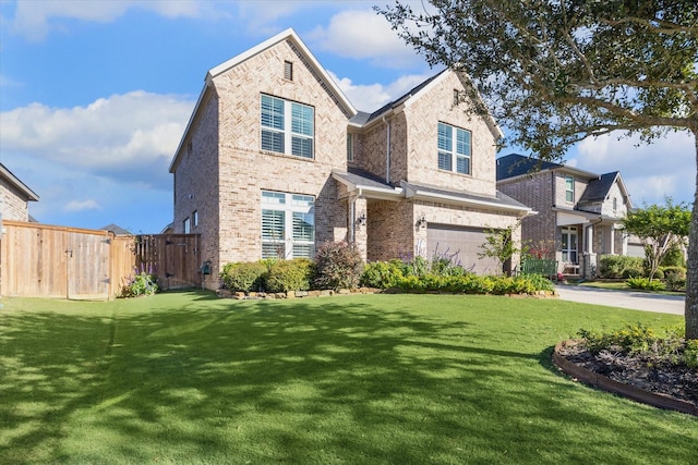809 Stella Vista Ct, Katy, TX 77493 - traditional-style house with brick siding, a garage, a gate, and concrete driveway