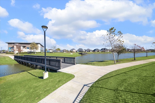 809 Stella Vista Ct, Katy, TX 77493 - view of home's community with a water view, a residential view, and a lawn