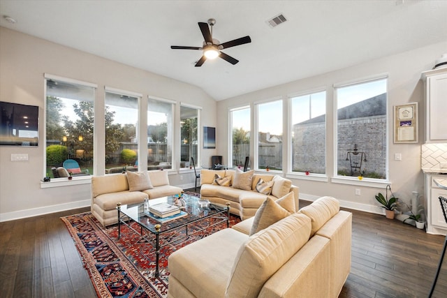 13234 James Terrace Ln, Houston, TX 77059 - living room with a ceiling fan, lofted ceiling, dark wood-style floors, and baseboards