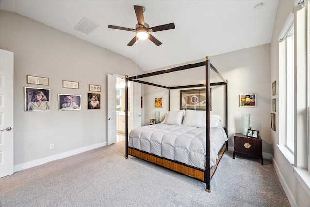 13234 James Terrace Ln, Houston, TX 77059 - bedroom with lofted ceiling, carpet flooring, baseboards, ceiling fan, and connected bathroom
