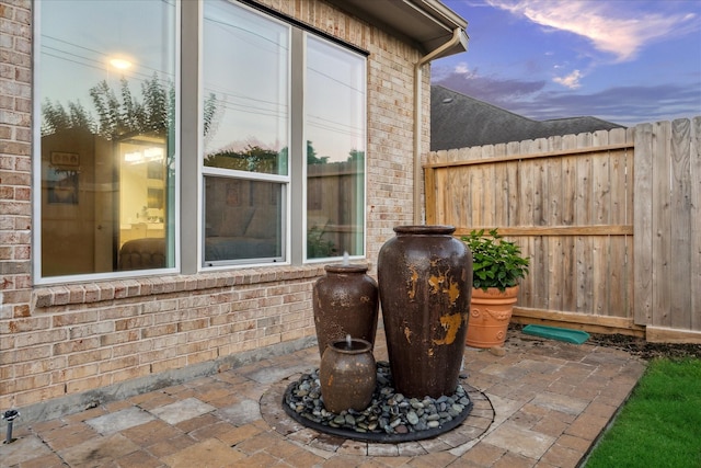 13234 James Terrace Ln, Houston, TX 77059 - patio terrace at dusk with fence