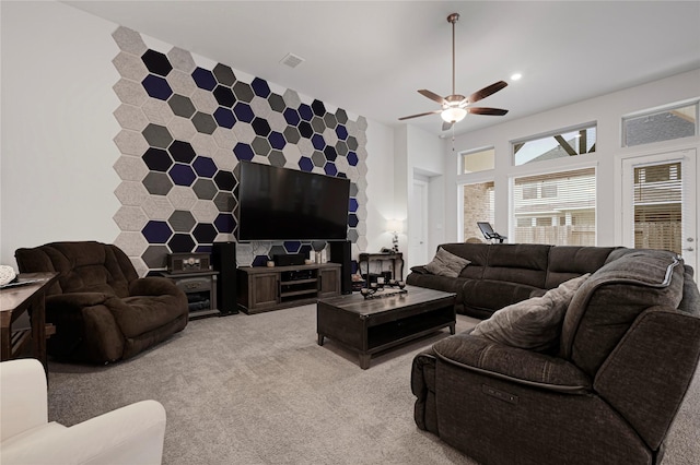 20814 Silver Lance Dr, Tomball, TX 77375 - living room featuring light carpet, ceiling fan, an accent wall, and recessed lighting