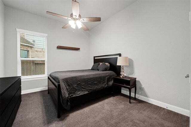 20814 Silver Lance Dr, Tomball, TX 77375 - bedroom featuring multiple windows, dark carpet, baseboards, and a ceiling fan
