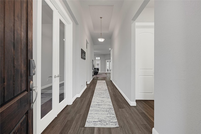20814 Silver Lance Dr, Tomball, TX 77375 - hall with dark wood-type flooring, baseboards, and french doors