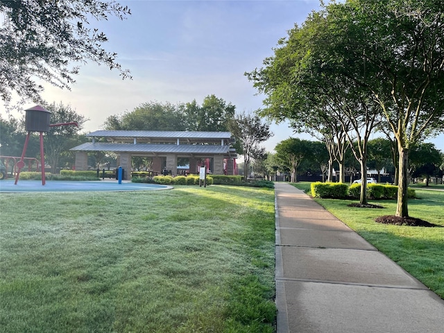 view of home's community featuring a yard