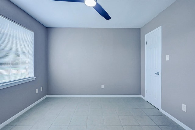 742 Pine Ave, Hempstead, TX 77445 - unfurnished room featuring ceiling fan, baseboards, and light tile patterned flooring