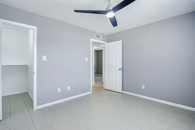 742 Pine Ave, Hempstead, TX 77445 - unfurnished bedroom featuring baseboards, ceiling fan, and a closet