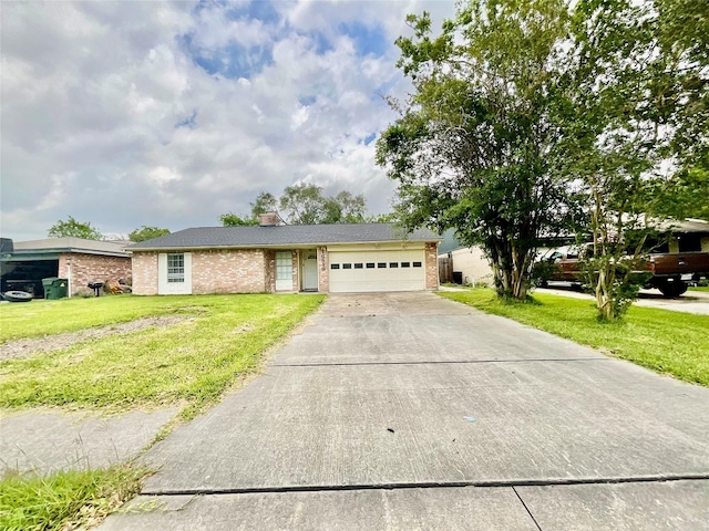 view of front of house with a garage, concrete driveway, brick siding, and a front lawn