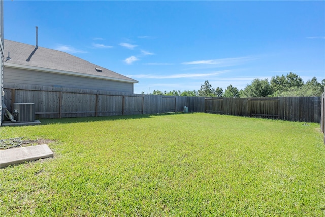 view of yard featuring central AC