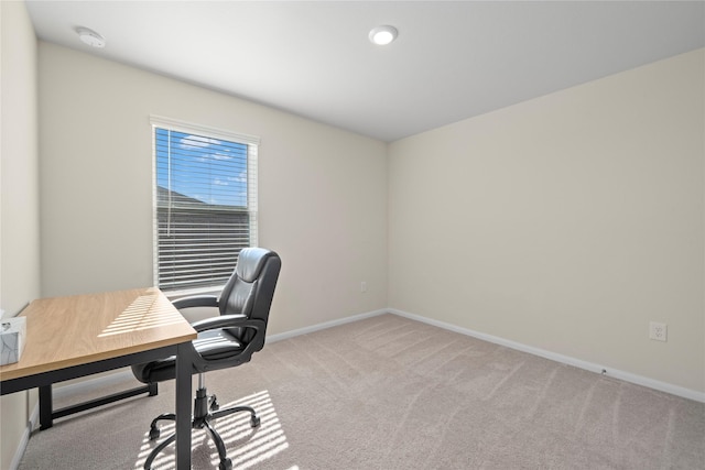 office with carpet floors and baseboards