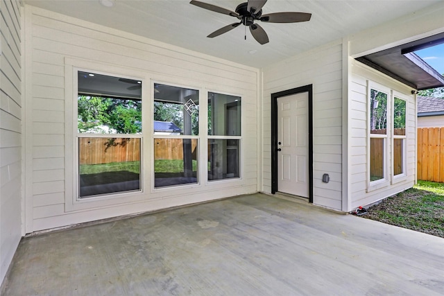 1107 N Main St, Dayton, TX 77535 - view of patio / terrace featuring a ceiling fan and fence