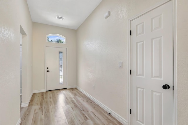 1107 N Main St, Dayton, TX 77535 - entrance foyer featuring light wood-style flooring and baseboards