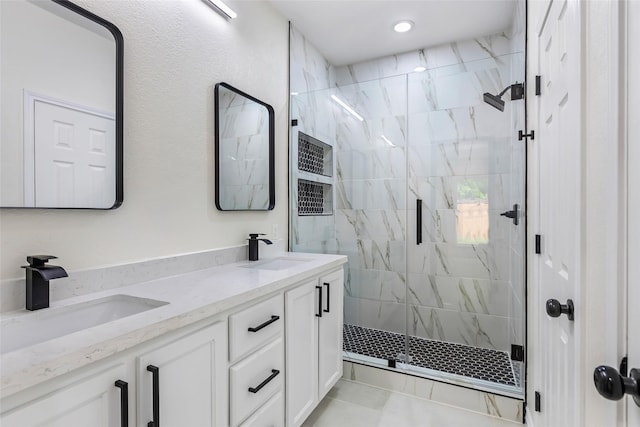1107 N Main St, Dayton, TX 77535 - bathroom featuring a shower stall and double vanity