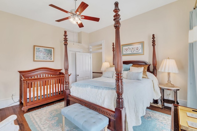 bedroom featuring wood finished floors and a ceiling fan