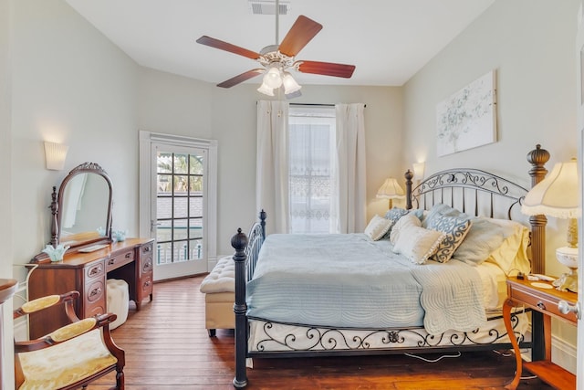 bedroom featuring hardwood / wood-style floors and ceiling fan