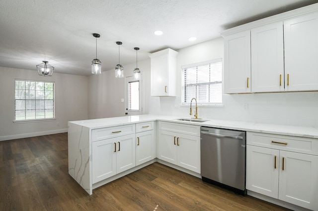 6002 Redfish Run, Baytown, TX 77523 - kitchen with stainless steel dishwasher, a sink, a peninsula, dark wood-style floors, and recessed lighting