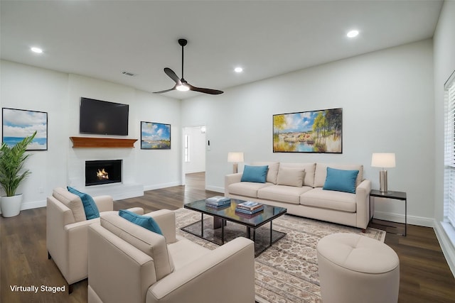 6002 Redfish Run, Baytown, TX 77523 - living area with ceiling fan, wood finished floors, baseboards, recessed lighting, and a lit fireplace