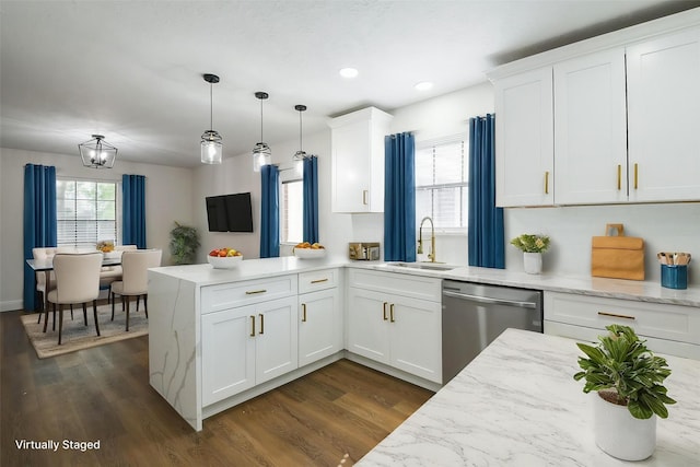 6002 Redfish Run, Baytown, TX 77523 - kitchen featuring dishwasher, a sink, a peninsula, dark wood finished floors, and white cabinets
