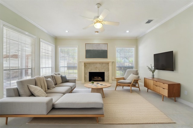 1706 Lofty Maple Trl, Houston, TX 77345 - living room featuring a ceiling fan, baseboards, a high end fireplace, crown molding, and light tile patterned floors