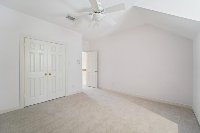 1706 Lofty Maple Trl, Houston, TX 77345 - unfurnished bedroom with carpet floors, a closet, vaulted ceiling, a ceiling fan, and baseboards