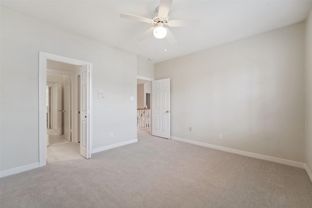 1706 Lofty Maple Trl, Houston, TX 77345 - unfurnished bedroom with light colored carpet, baseboards, and a ceiling fan