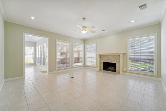 1706 Lofty Maple Trl, Houston, TX 77345 - unfurnished living room featuring baseboards, light tile patterned floors, healthy amount of natural light, recessed lighting, and crown molding